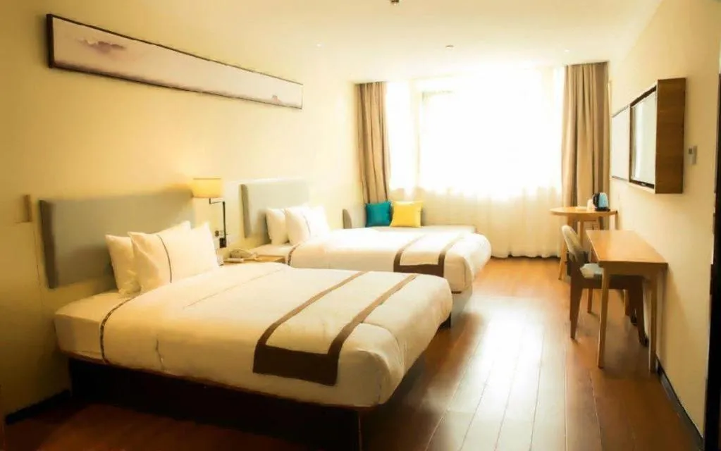 Bed in JTOUR Inn Hechi Yizhou Municipal Central Plaza