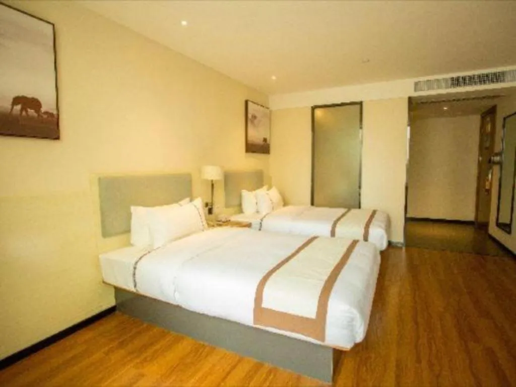 Bed in JTOUR Inn Hechi Yizhou Municipal Central Plaza