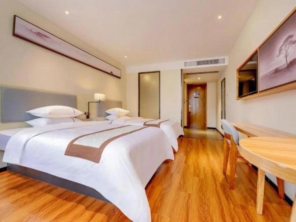 Bed in JTOUR Inn Hechi Yizhou Municipal Central Plaza