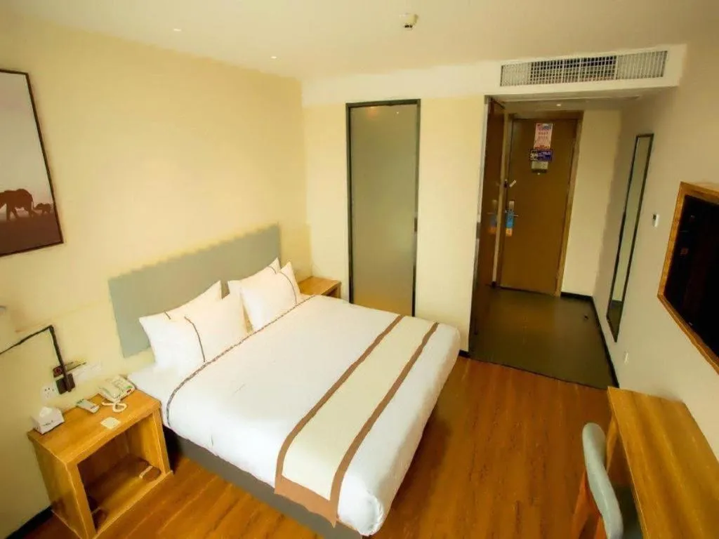 Bed in JTOUR Inn Hechi Yizhou Municipal Central Plaza