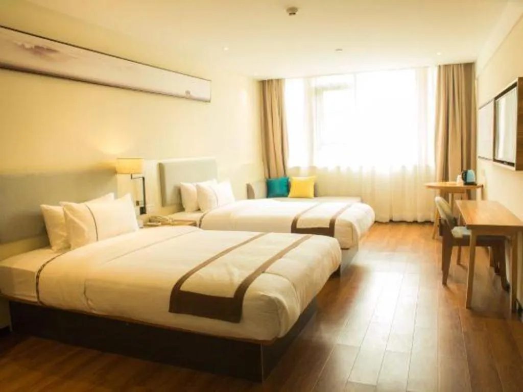 Bed in JTOUR Inn Hechi Yizhou Municipal Central Plaza