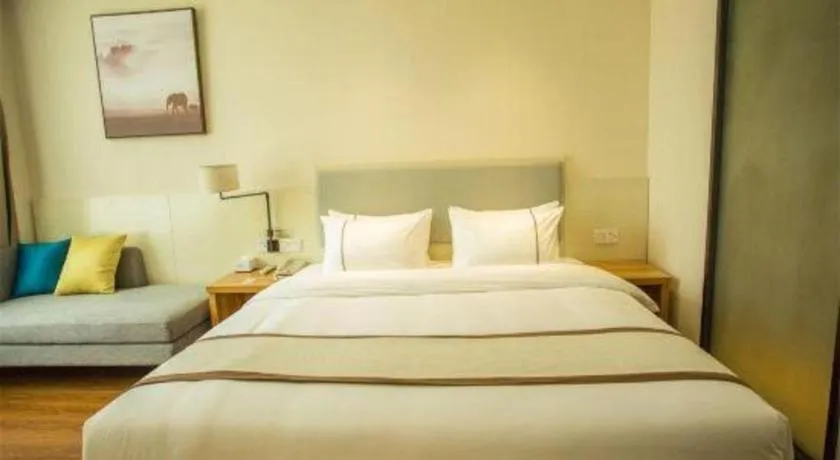 Bed in JTOUR Inn Hechi Yizhou Municipal Central Plaza