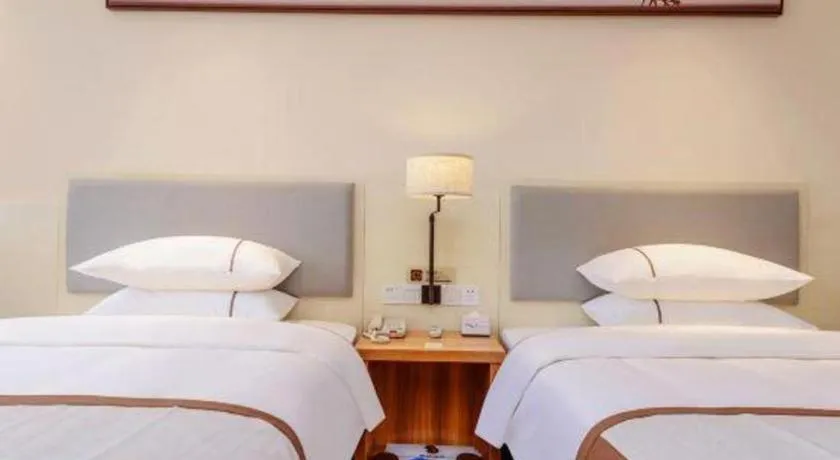 Bed in JTOUR Inn Hechi Yizhou Municipal Central Plaza