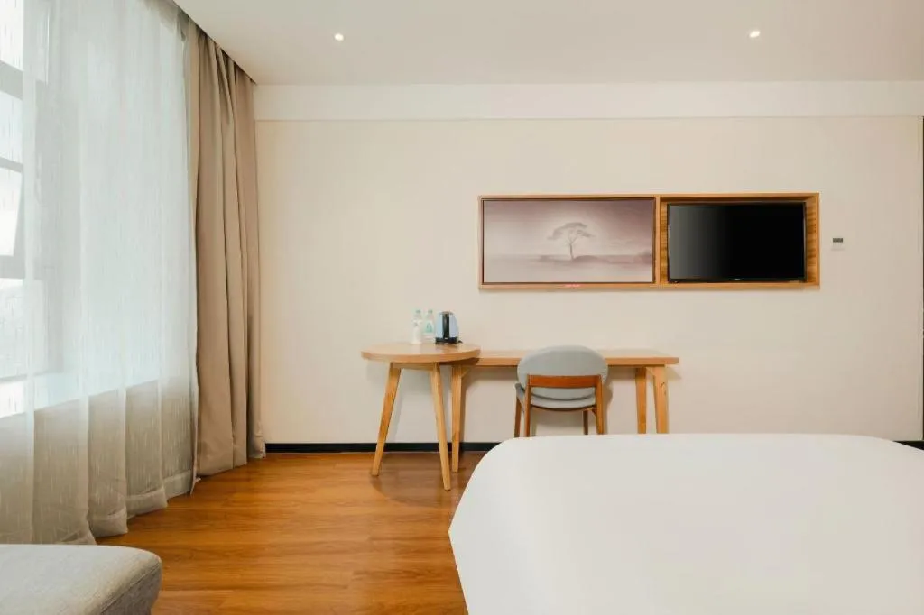 Bed in JTOUR Inn Hechi Yizhou Municipal Central Plaza