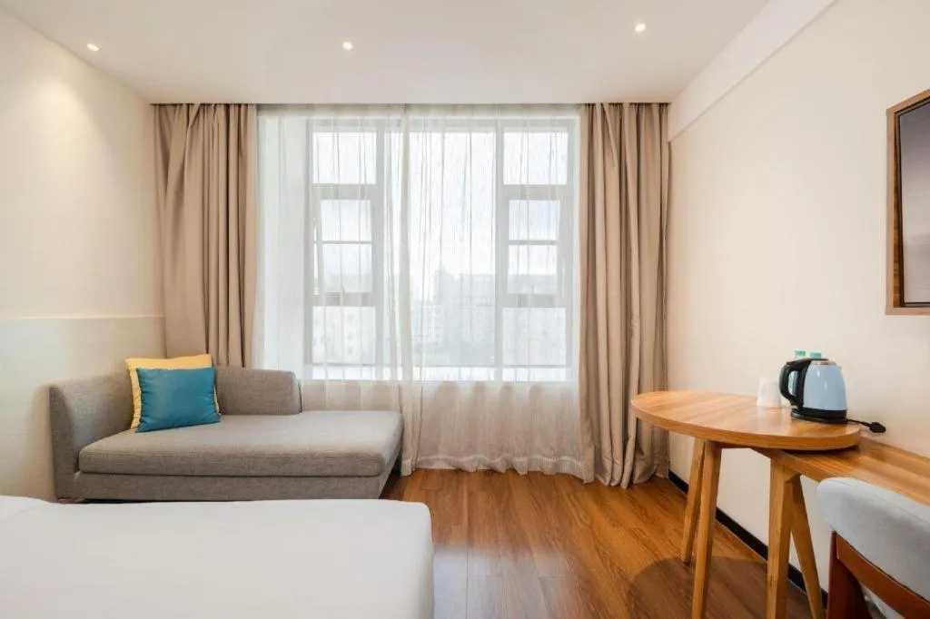 Bed in JTOUR Inn Hechi Yizhou Municipal Central Plaza