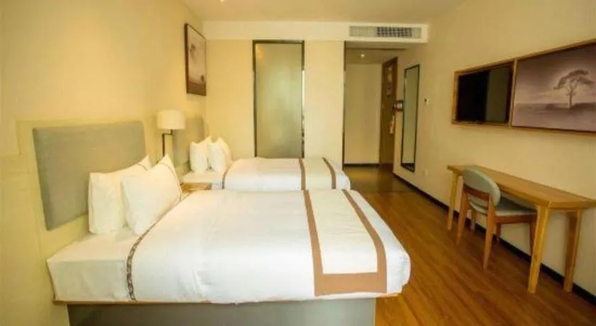 Bed in JTOUR Inn Hechi Yizhou Municipal Central Plaza