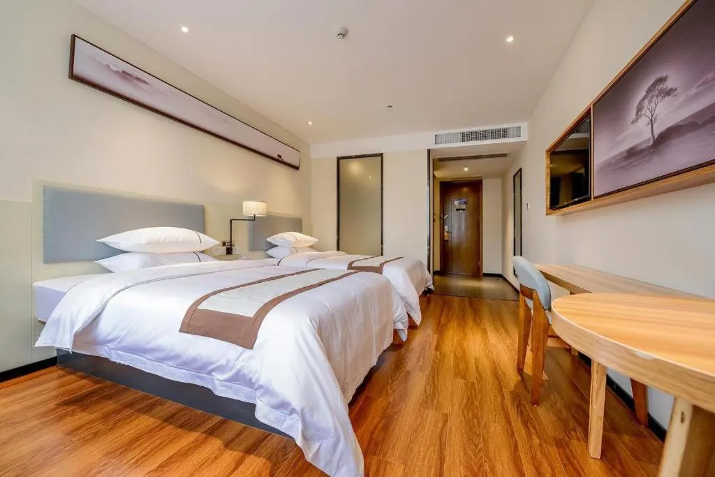 Bed in JTOUR Inn Hechi Yizhou Municipal Central Plaza