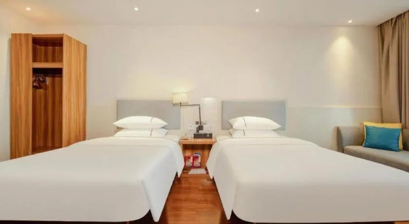 Bed in JTOUR Inn Hechi Yizhou Municipal Central Plaza