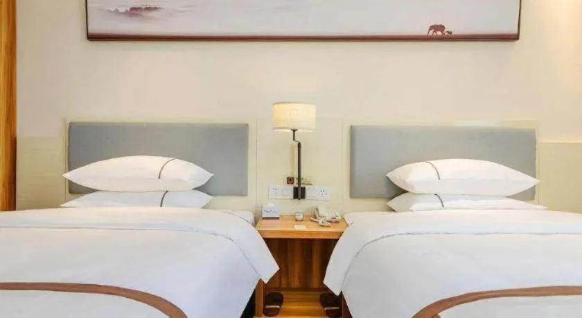 Bed in JTOUR Inn Hechi Yizhou Municipal Central Plaza