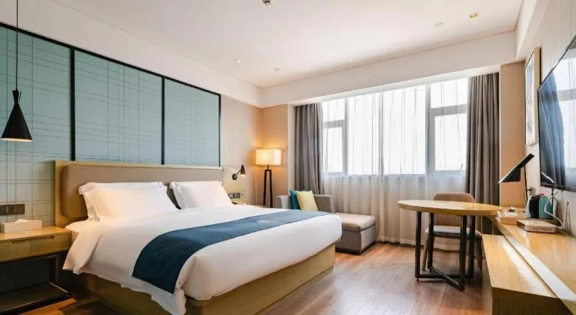 Bed in Echarm Hotel Nanning Chaoyang Square River View