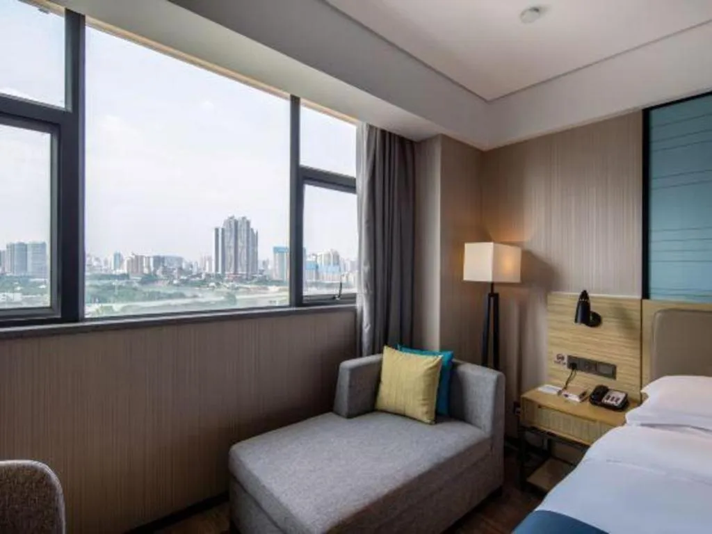 Bed in Echarm Hotel Nanning Chaoyang Square River View