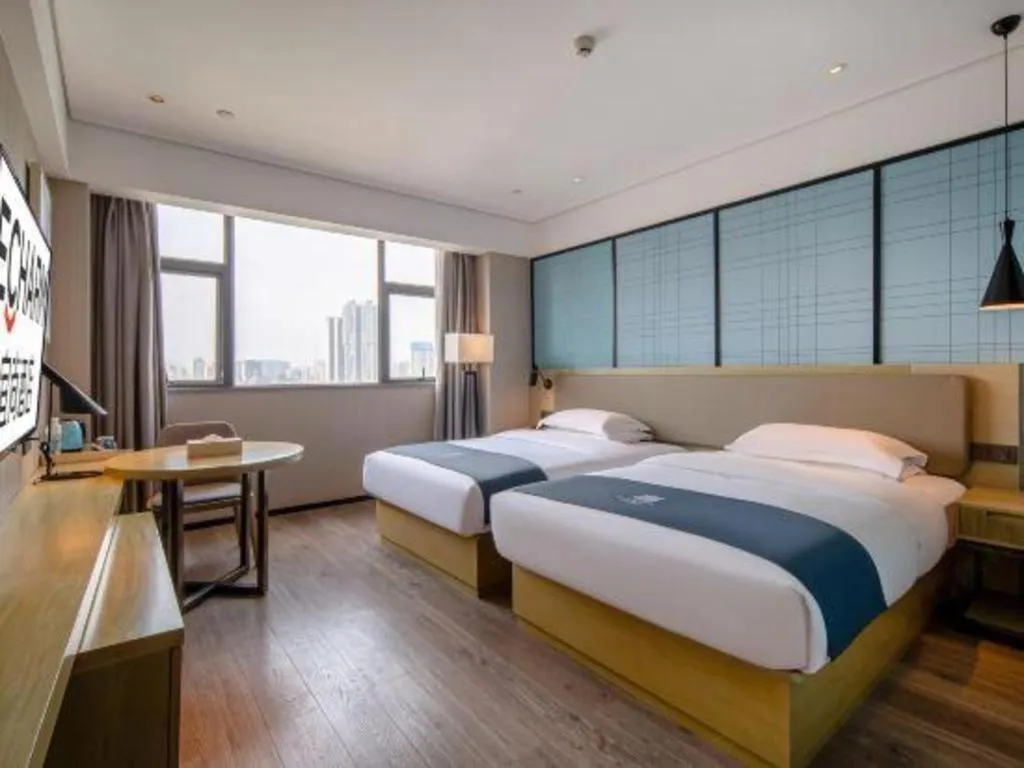 Bed in Echarm Hotel Nanning Chaoyang Square River View