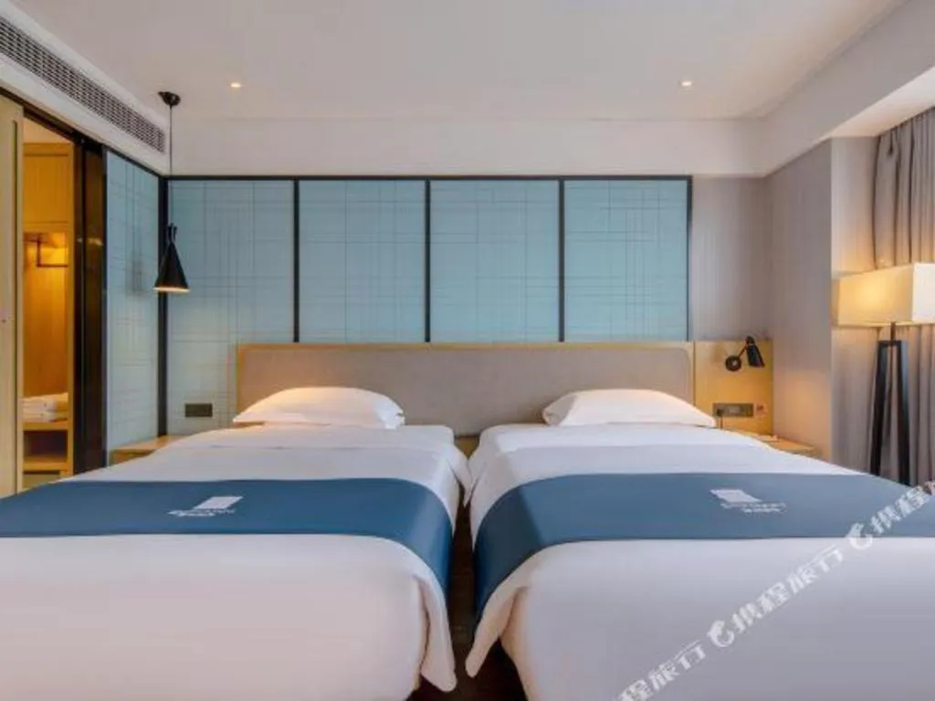 Bed in Echarm Hotel Nanning Chaoyang Square River View