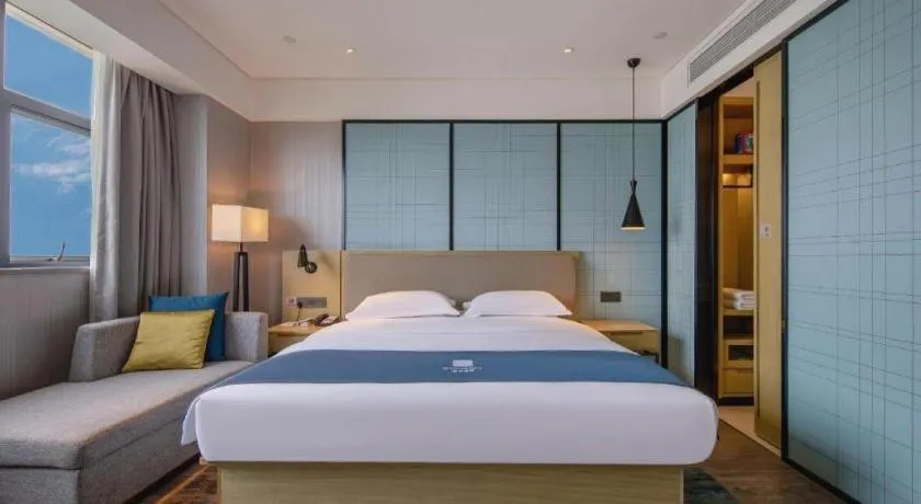 Bed in Echarm Hotel Nanning Chaoyang Square River View