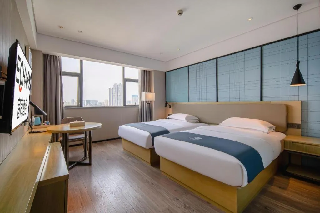 Bed in Echarm Hotel Nanning Chaoyang Square River View