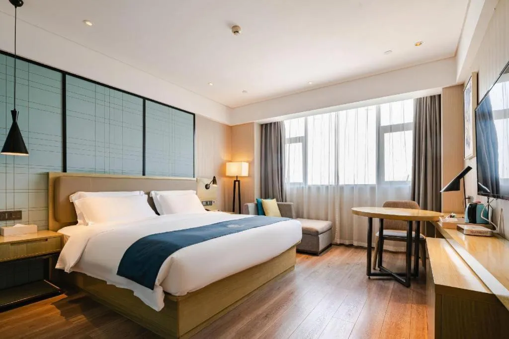 Bed in Echarm Hotel Nanning Chaoyang Square River View