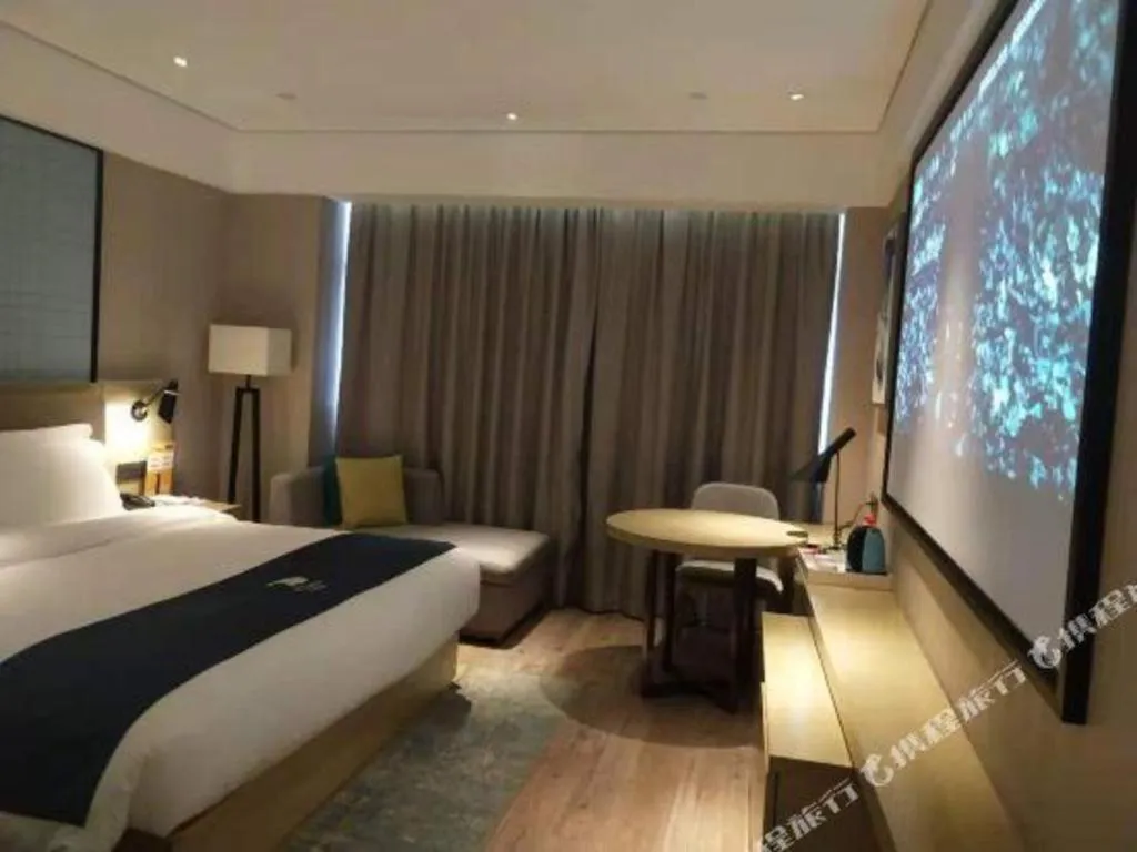 Bed in Echarm Hotel Nanning Chaoyang Square River View