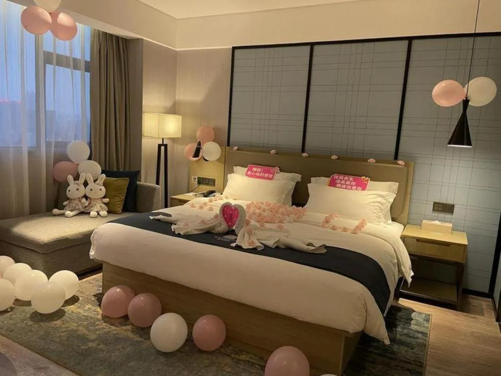 Bed in Echarm Hotel Nanning Chaoyang Square River View