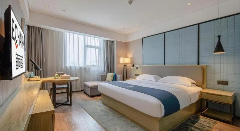 Bed in Echarm Hotel Nanning Chaoyang Square River View