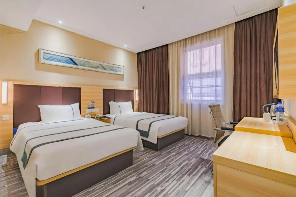 Bed in City Comfort Inn Guangzhou Shangxiajiu Hualin Temple Chenjiaci Metro Station