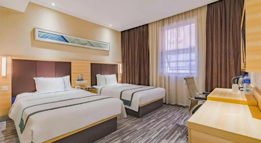 Bed in City Comfort Inn Guangzhou Shangxiajiu Hualin Temple Chenjiaci Metro Station