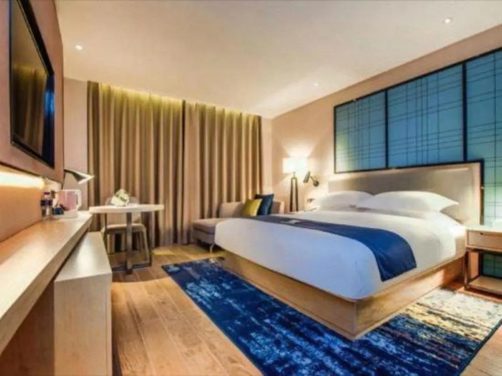 Bed in Echarm Hotel Anshun High-speed Railway Station Jichang Road