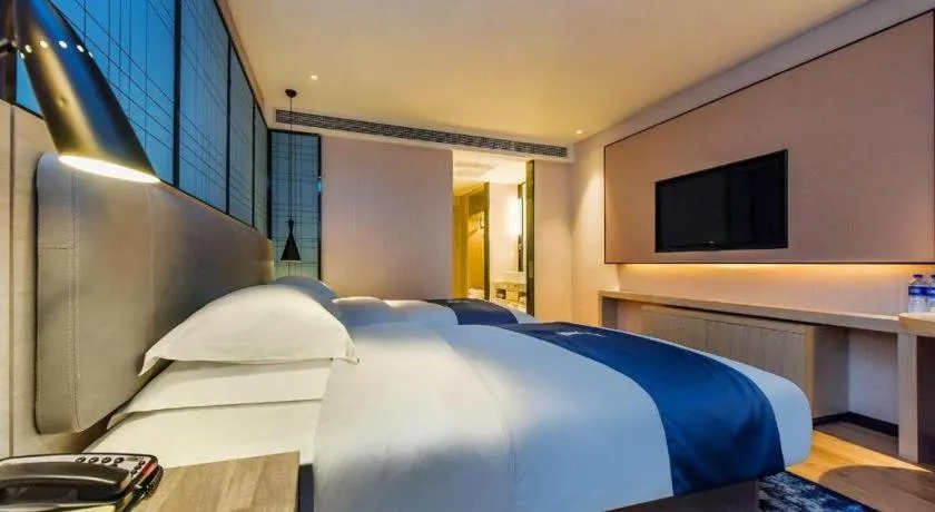 Bed in Echarm Hotel Anshun High-speed Railway Station Jichang Road