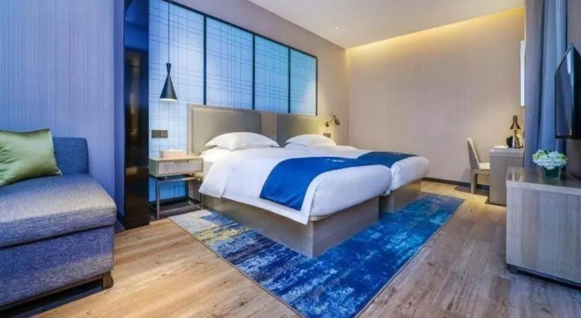 Bed in Echarm Hotel Anshun High-speed Railway Station Jichang Road