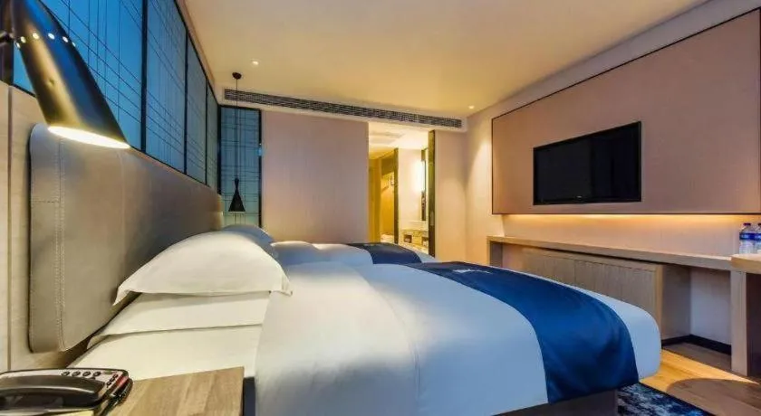 Bed in Echarm Hotel Anshun High-speed Railway Station Jichang Road