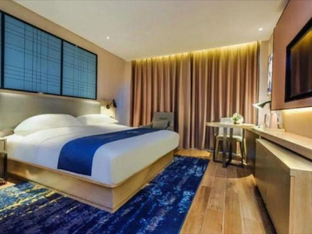 Bed in Echarm Hotel Anshun High-speed Railway Station Jichang Road