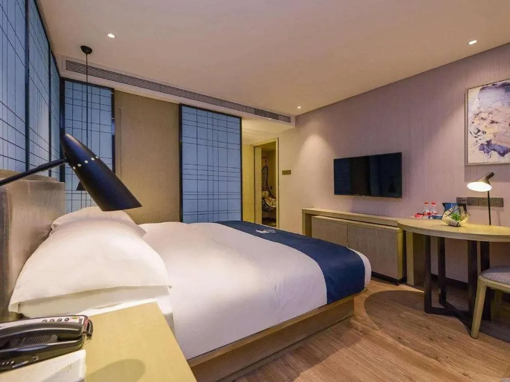 Bed in Echarm Hotel Anshun High-speed Railway Station Jichang Road