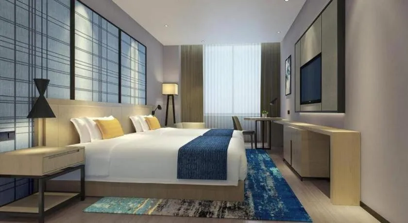 Bed in Echarm Hotel Anshun High-speed Railway Station Jichang Road