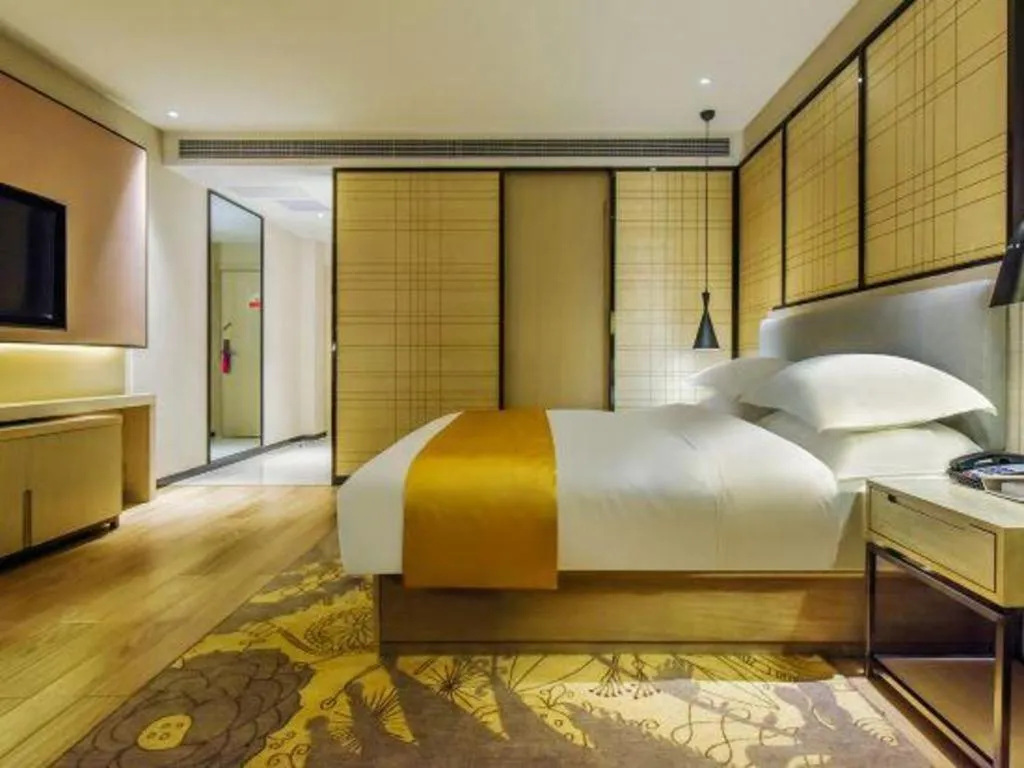 Bed in Echarm Hotel Anshun High-speed Railway Station Jichang Road