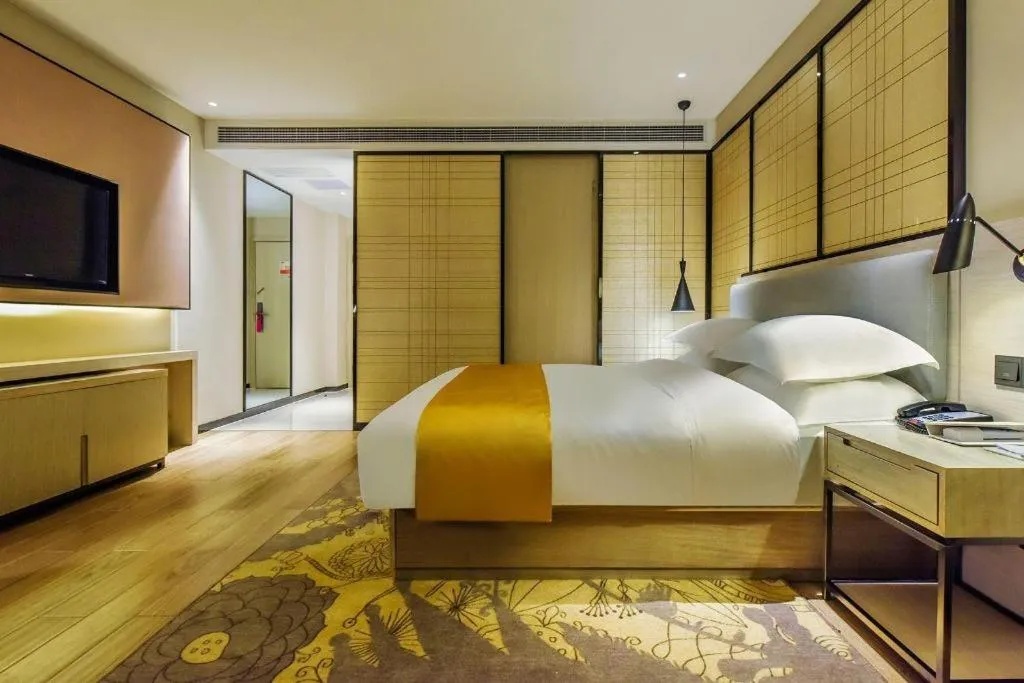 Bed in Echarm Hotel Anshun High-speed Railway Station Jichang Road
