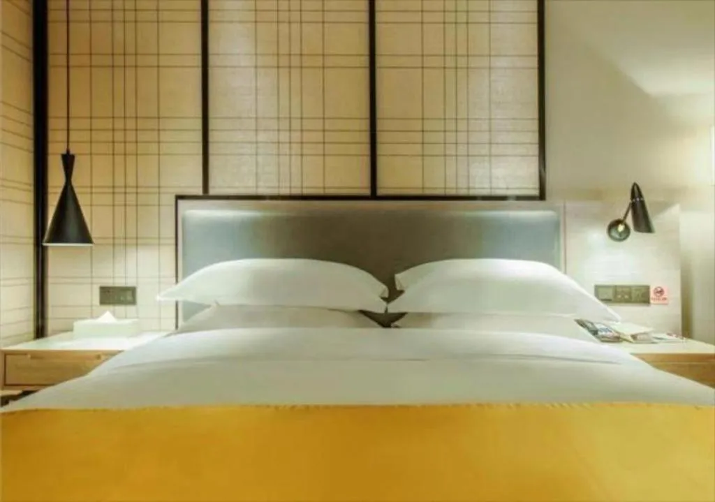 Bed in Echarm Hotel Anshun High-speed Railway Station Jichang Road