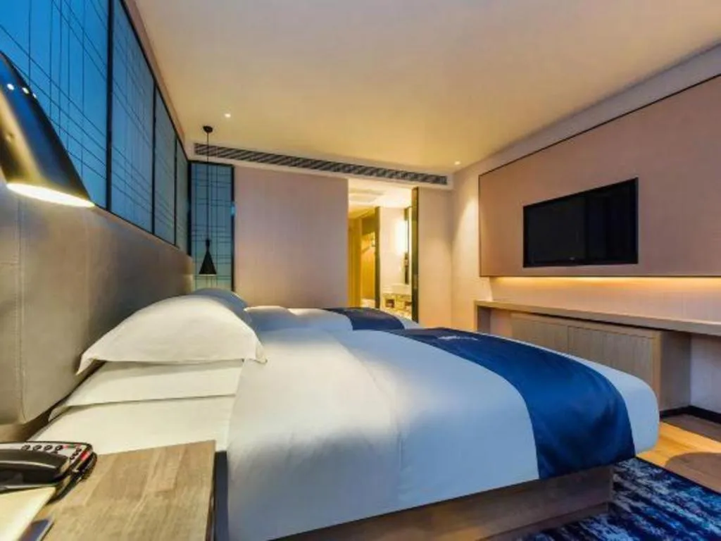 Bed in Echarm Hotel Anshun High-speed Railway Station Jichang Road