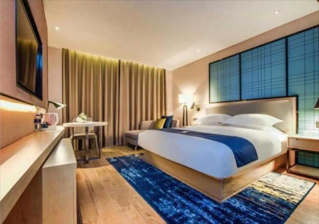 Bed in Echarm Hotel Anshun High-speed Railway Station Jichang Road