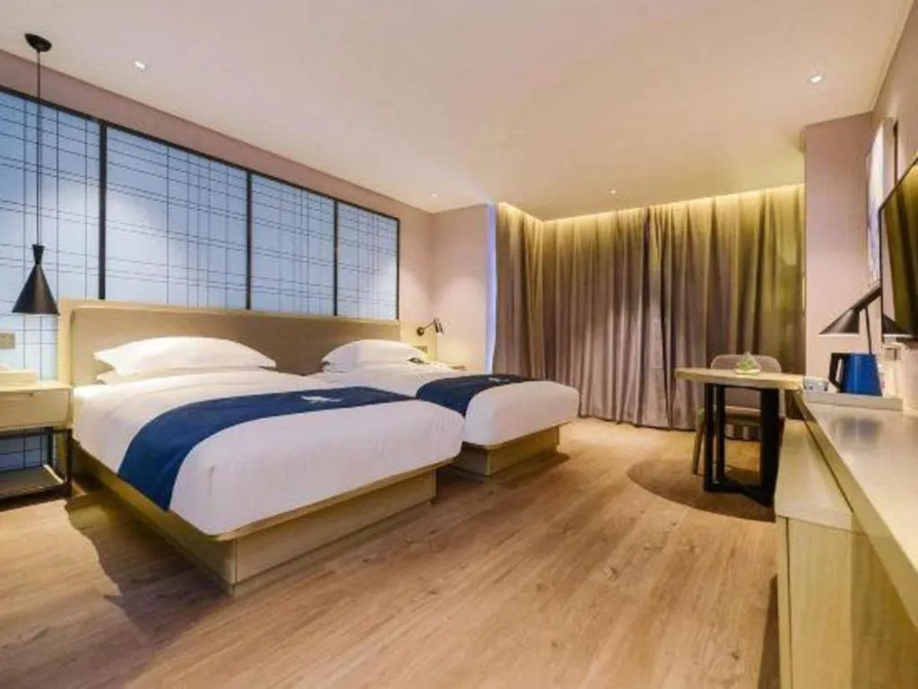 Bed in Echarm Hotel Anshun High-speed Railway Station Jichang Road