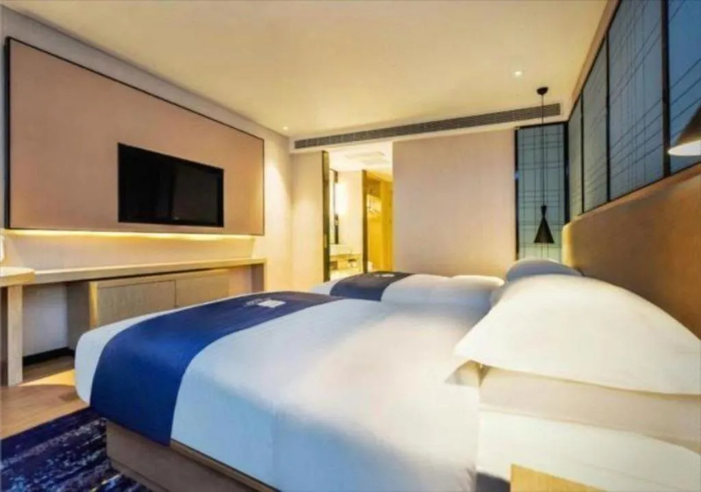 Bed in Echarm Hotel Anshun High-speed Railway Station Jichang Road