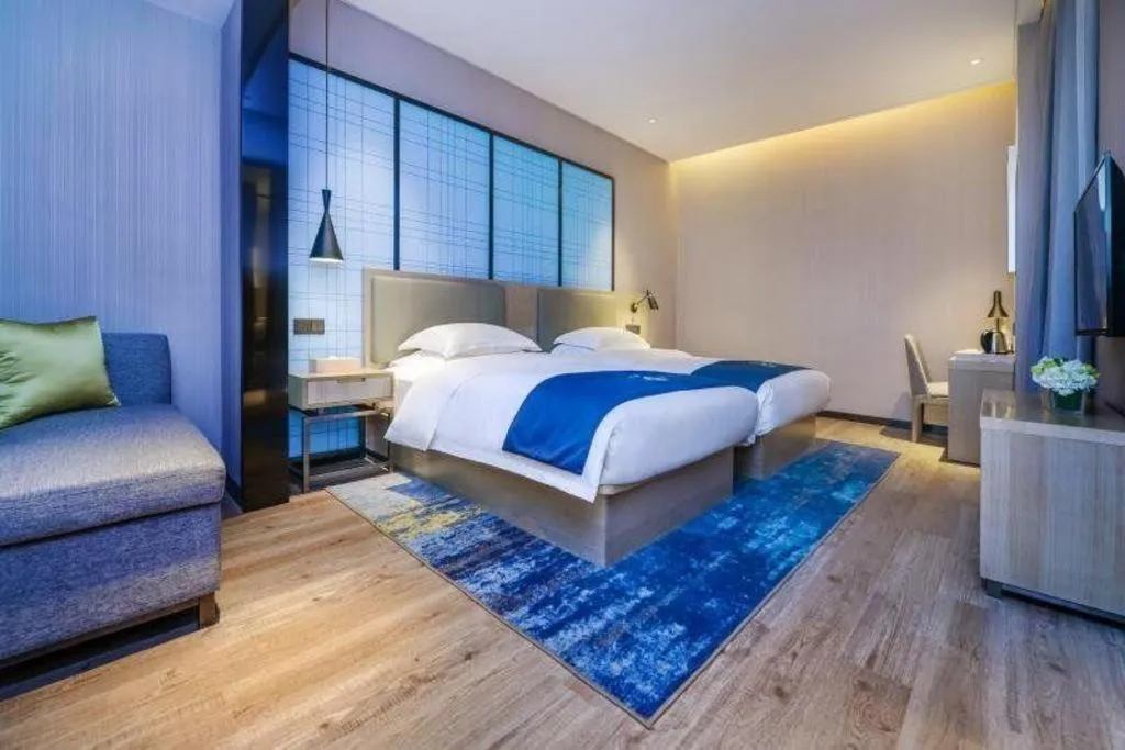 Bed in Echarm Hotel Anshun High-speed Railway Station Jichang Road