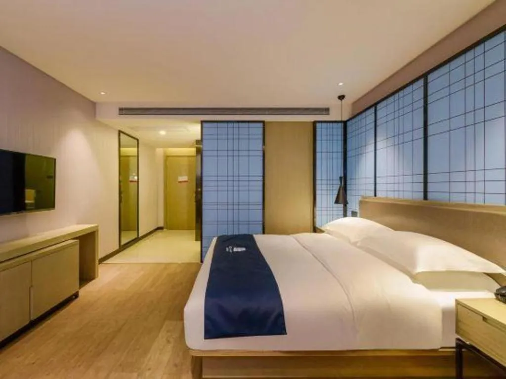 Bed in Echarm Hotel Anshun High-speed Railway Station Jichang Road