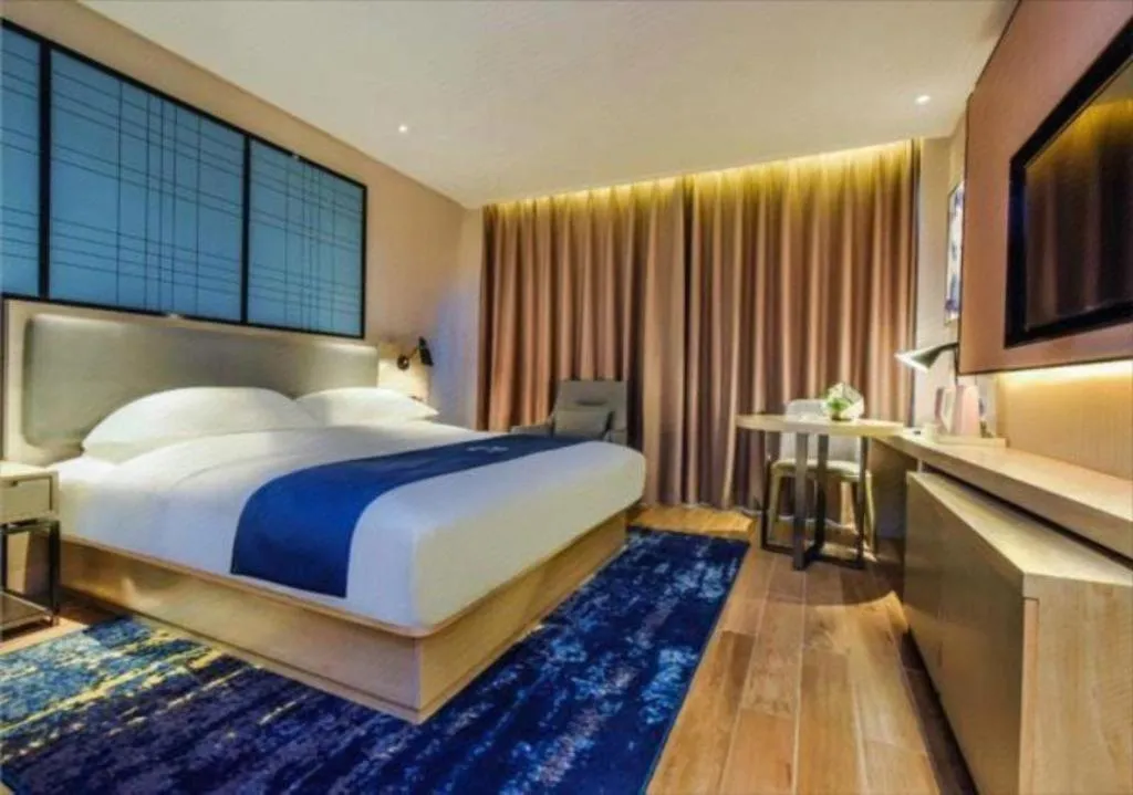 Bed in Echarm Hotel Anshun High-speed Railway Station Jichang Road