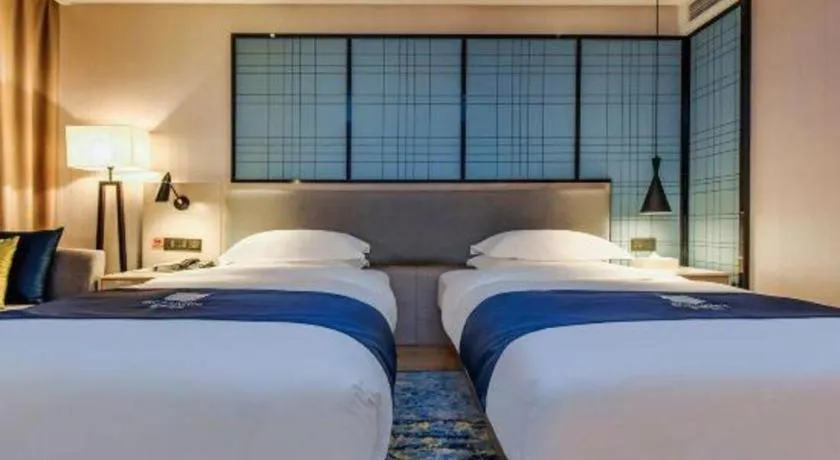 Bed in Echarm Hotel Anshun High-speed Railway Station Jichang Road