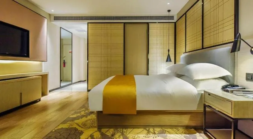 Bed in Echarm Hotel Anshun High-speed Railway Station Jichang Road