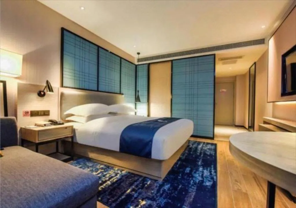 Bed in Echarm Hotel Anshun High-speed Railway Station Jichang Road