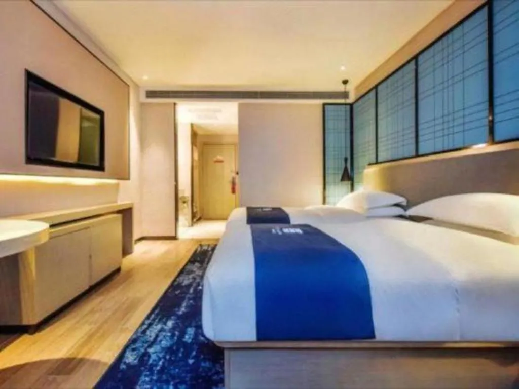 Bed in Echarm Hotel Anshun High-speed Railway Station Jichang Road