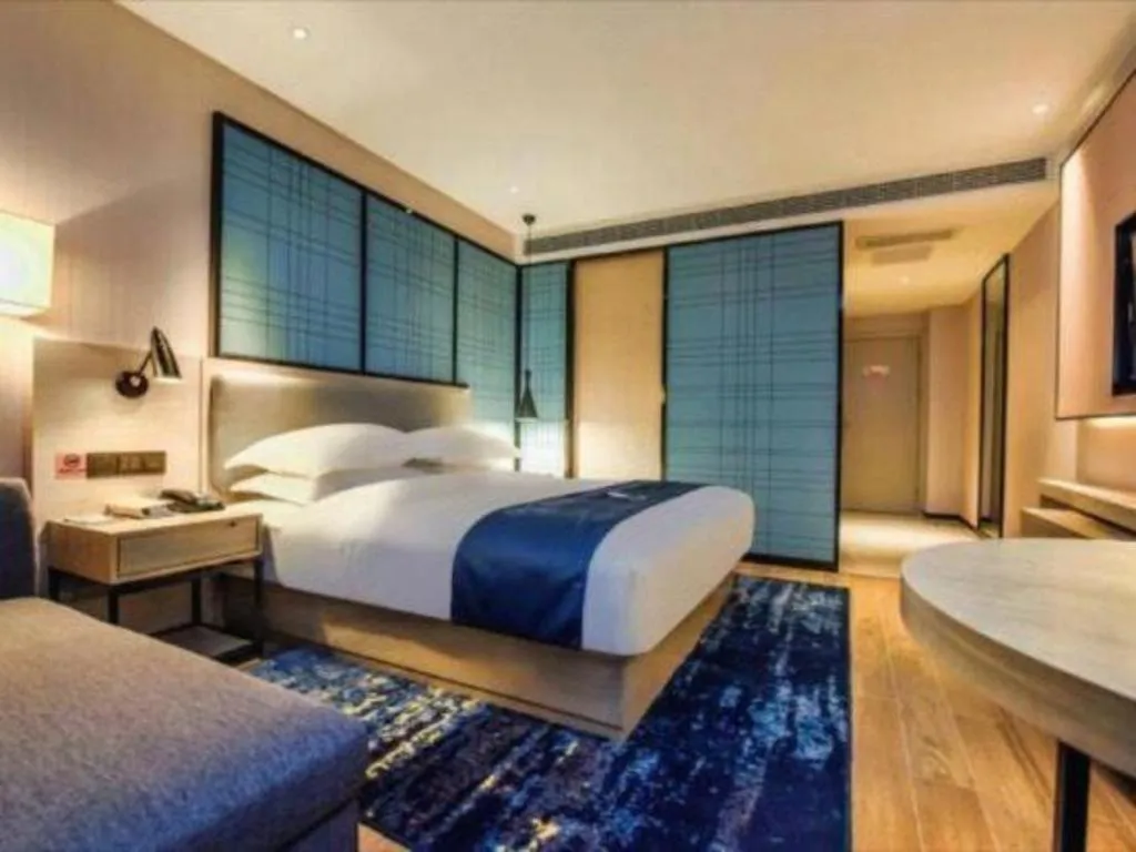 Bed in Echarm Hotel Anshun High-speed Railway Station Jichang Road