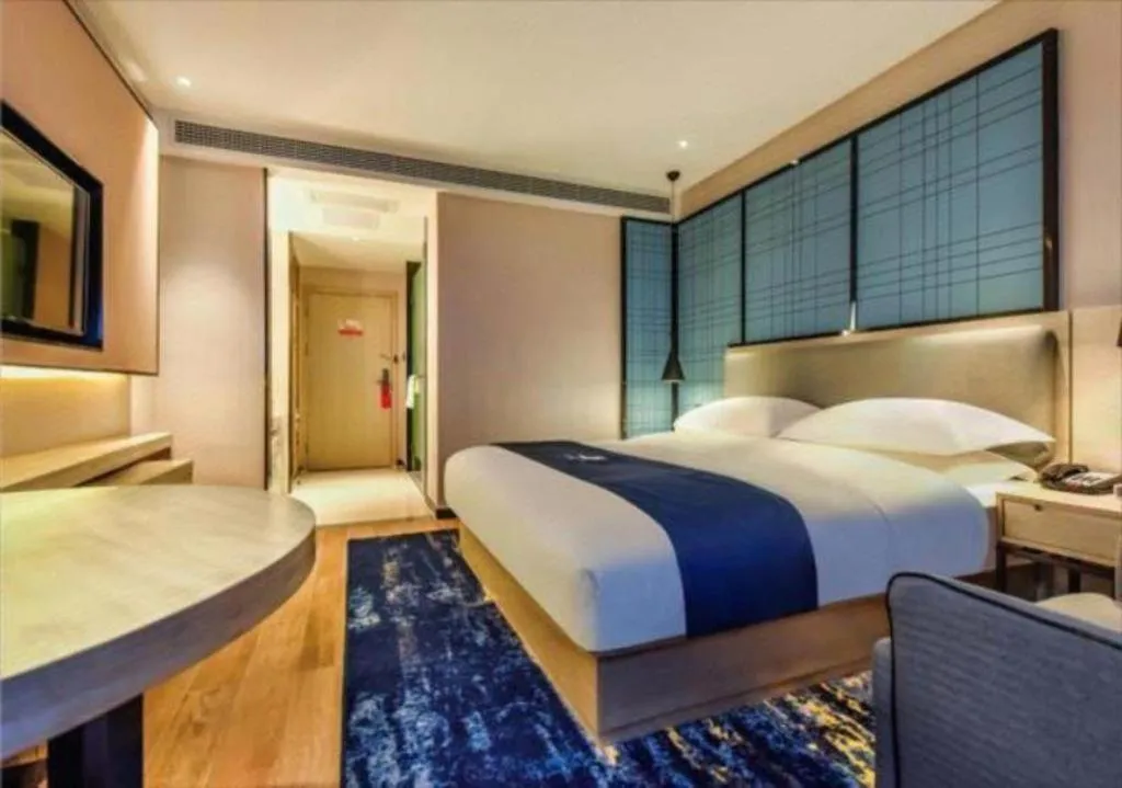 Bed in Echarm Hotel Anshun High-speed Railway Station Jichang Road