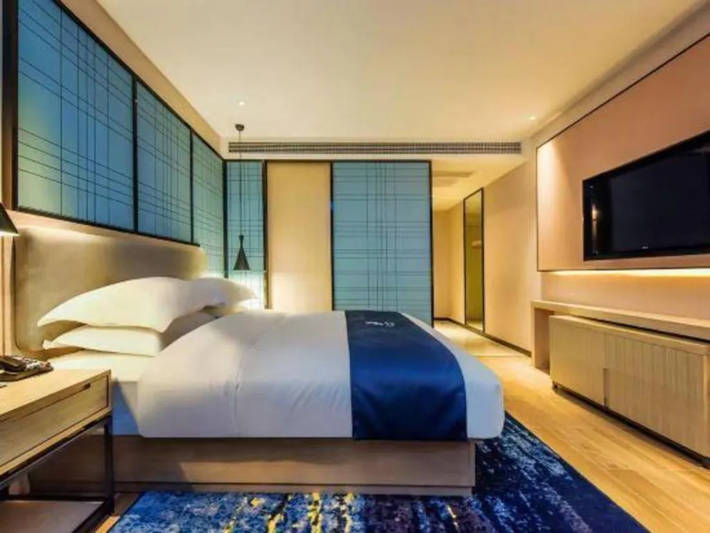 Bed in Echarm Hotel Anshun High-speed Railway Station Jichang Road