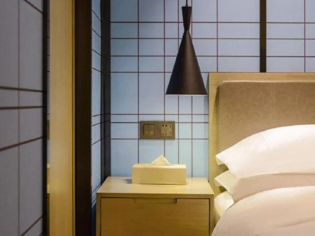 Bed in Echarm Hotel Anshun High-speed Railway Station Jichang Road